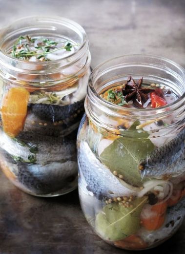 Stylishly shot pickled herring for Christmas in Sweden