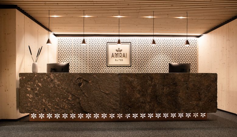 Modernist Hotel Reception Design | Stone monolith by Alpstein Architects | New Hotel | Amrai Suites | New Design Hotel in Schruns, Montafon, Vorarlberg Austria | The Aficionados 