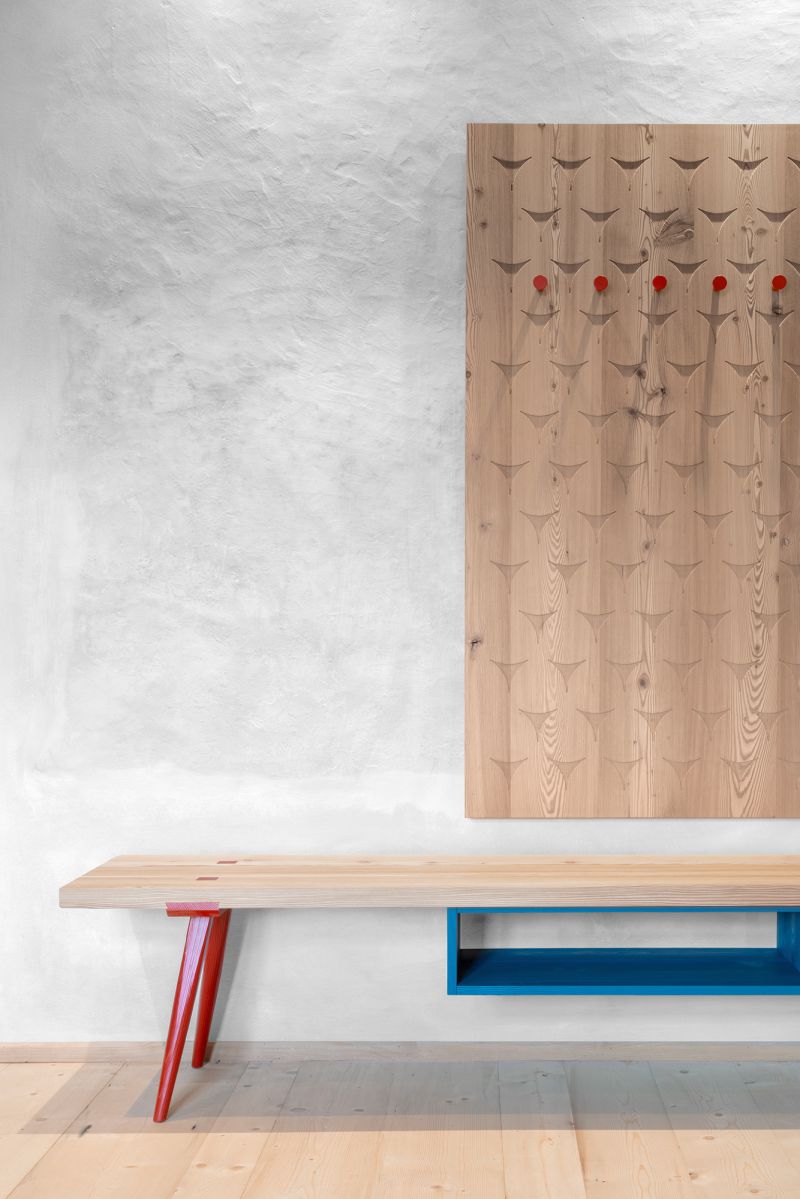 Modernist sustainable interior design, limewash walls, natural timber furniture | Oberbuchfelder Hof | Boutique Farmhouse Accommodation in Laion, South Tyrol