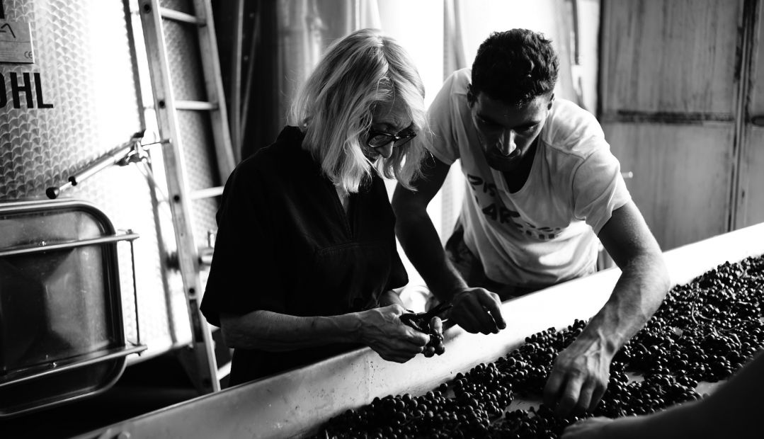 Cupano Wine Cellars | man and woman discuss wine production 