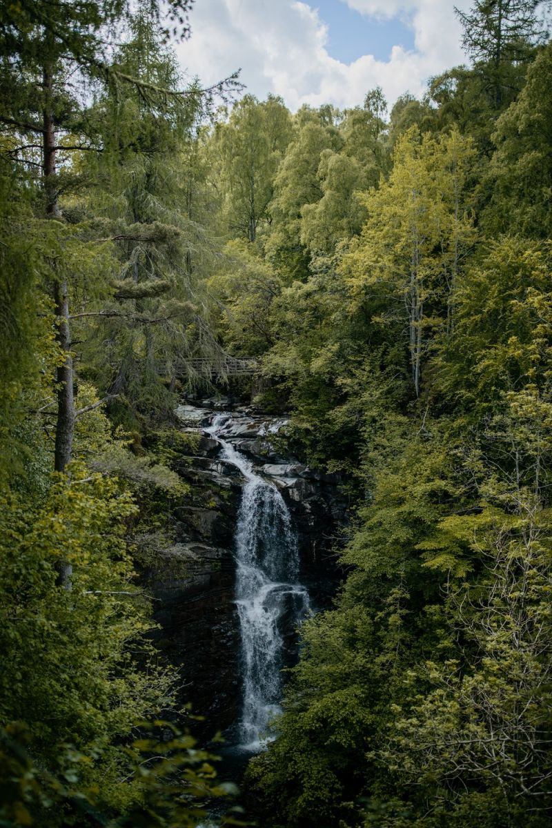 Forest waterfall in the highlands of Scotland remote walks | Luxury Wilderness Escapes & Exclusive Highland Experiences | Dun Aluinn