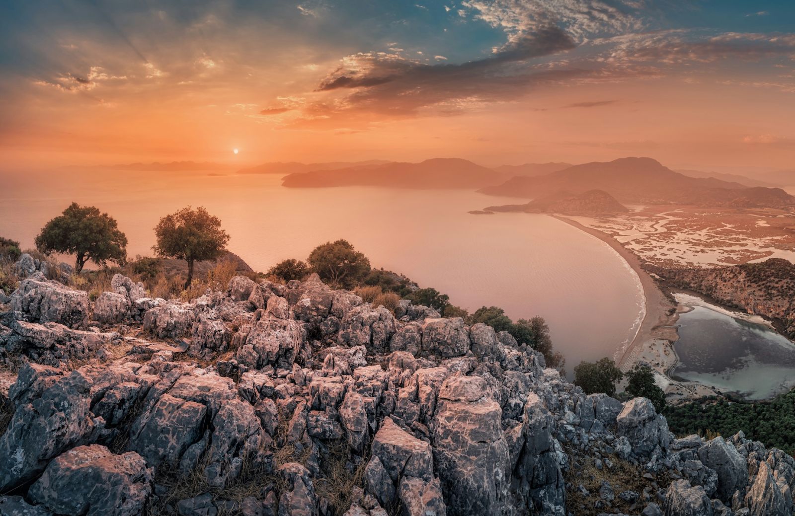 Beautiful orange sunset over the coastline and Aegean Sea |Muğla Boutique Hotels & Creative Escapes | The Aficionados