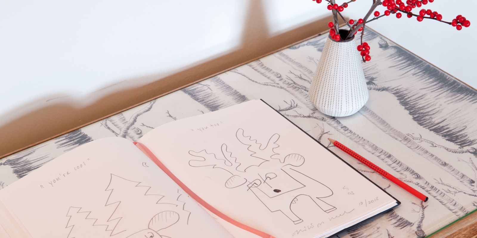 Creative hotel guest book with drawing about a stay, culture travel and art, little details