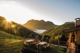 Borgo Eibn Mountain Lodge overlooks the Carnic Alps in Sauris, Friuli Venezia Giulia, Italy. A boutique hotel, spa & restaurant with chalet style accommodation.