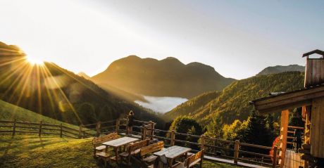 Borgo Eibn Mountain Lodge overlooks the Carnic Alps in Sauris, Friuli Venezia Giulia, Italy. A boutique hotel, spa & restaurant with chalet style accommodation.