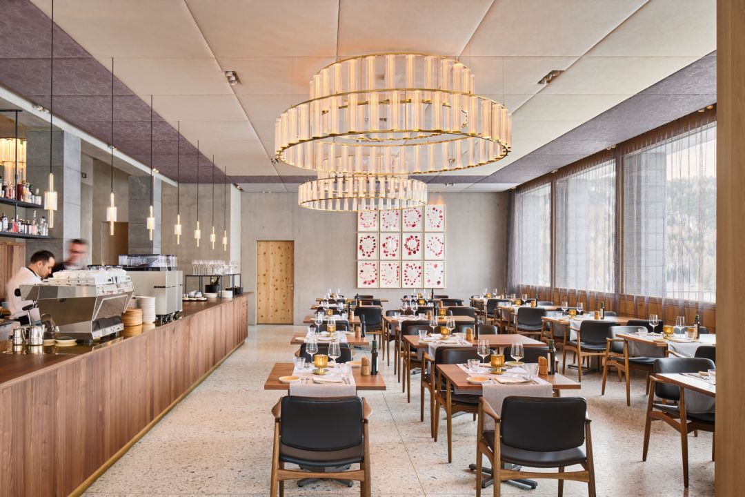 Glass modern chandeliers, minimalist design. restaurant interiors Switzerland | Maistra 160 Pontresina, Engadin | The Best Design Hotels & Spas in Grisons, Switzerland | Designed by Architect Gion A. Caminada | Plattner & Plattner