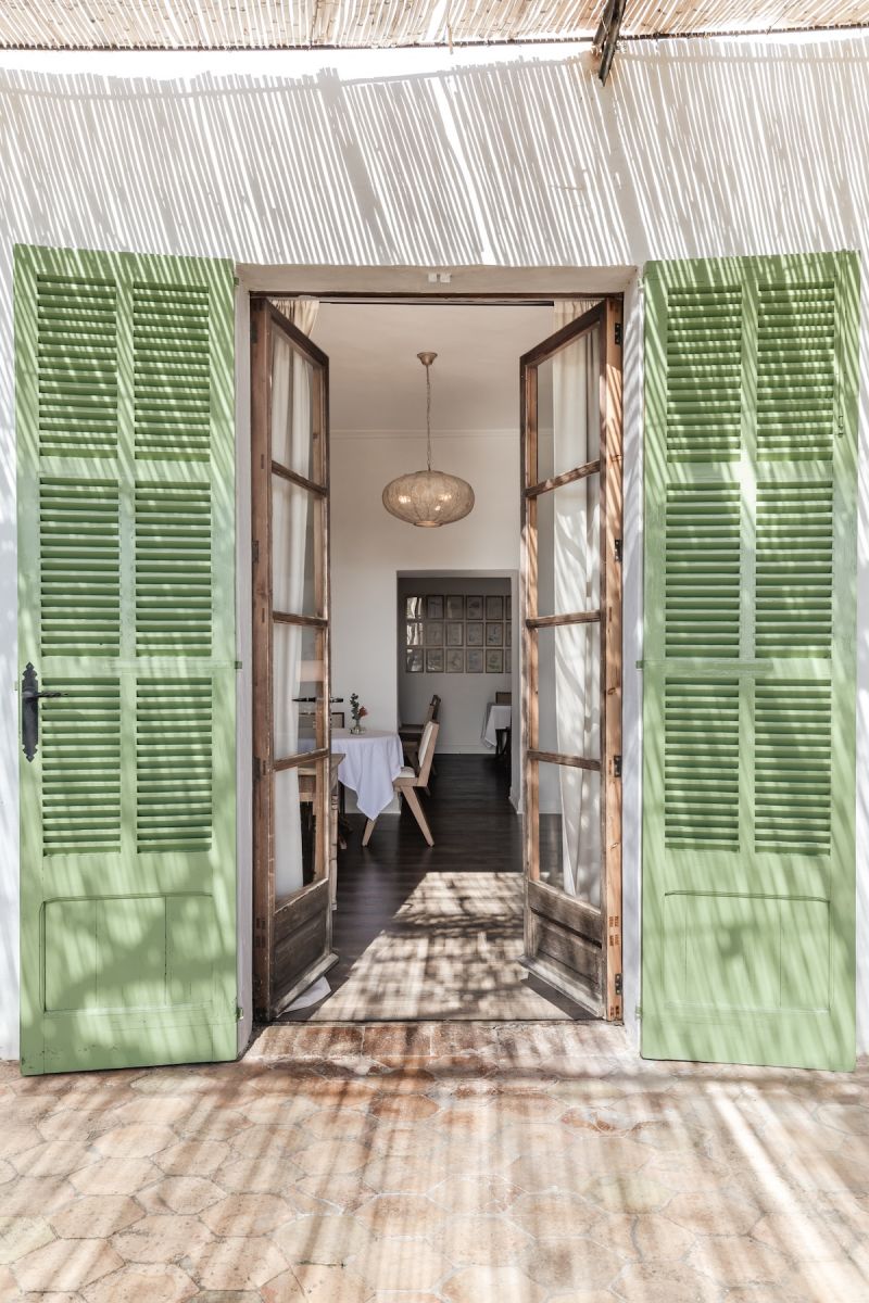 Green shutteres traditinoal Finca architecure and style | Ca’n Beneït Mallorca – Historic, Boutique Hotels in the Serra de Tramuntana, Spain