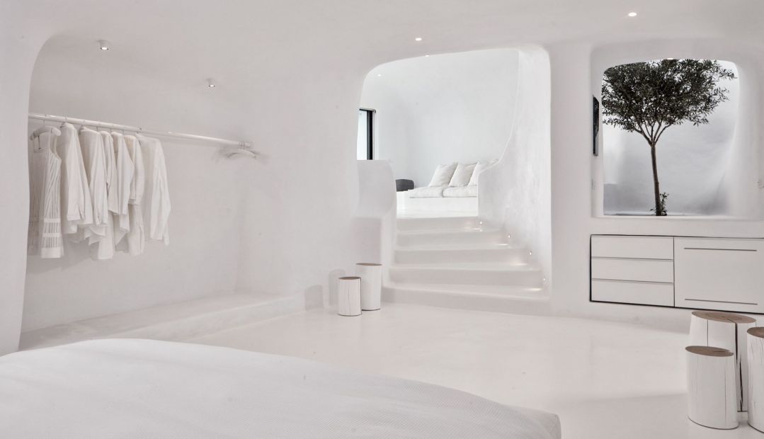 Design interiors Cyclades White, luxury bedroom, Villa Charissa at Aenaon Villas Santorini designed by Elly Alexiou (Architect) and Maria-Christina Alexiou 