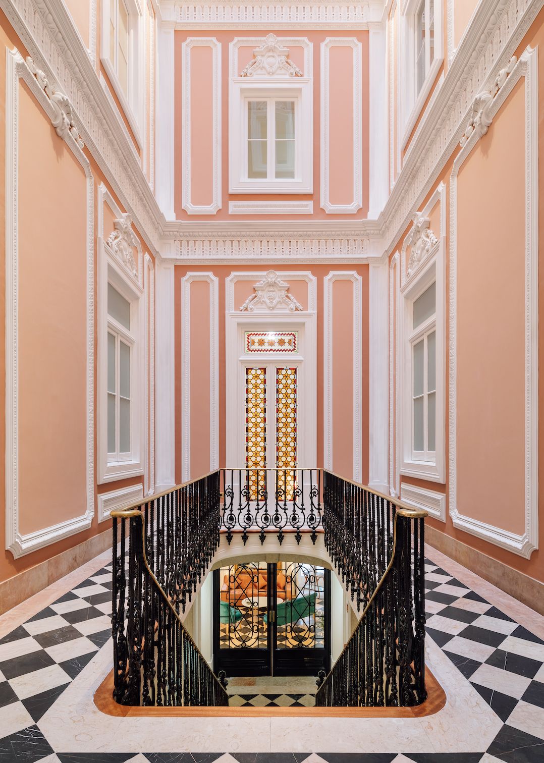 Restored Heritage Lisbon Stairwell in pink plaster | Palacio Principe Real | Luxury Boutique Hotel Lisbon | The Aficionados