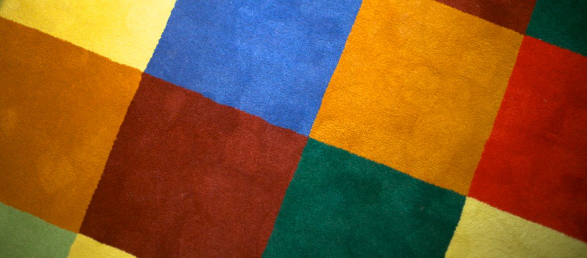 olourful block rug by Adolf Krischanitz for Hotel Altstadt's interior design of room 64