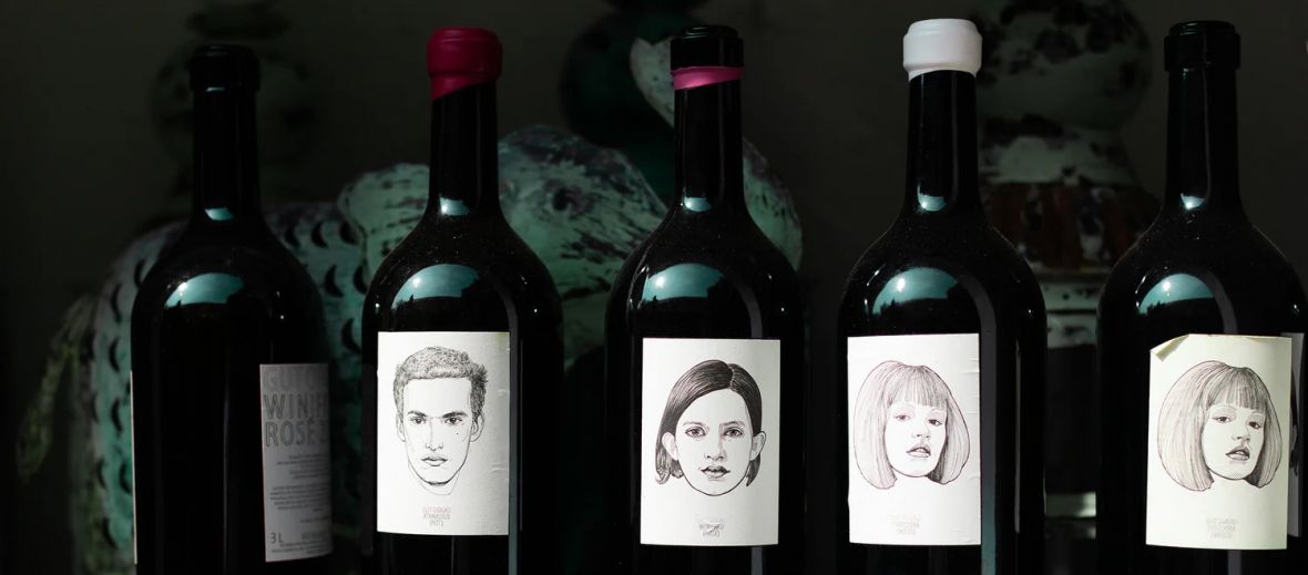 Gut Oggau's wine bottles with labels drawn by artist Jung Von Matt, a famous Austrian brand of vineyards famous for biodynamic approaches