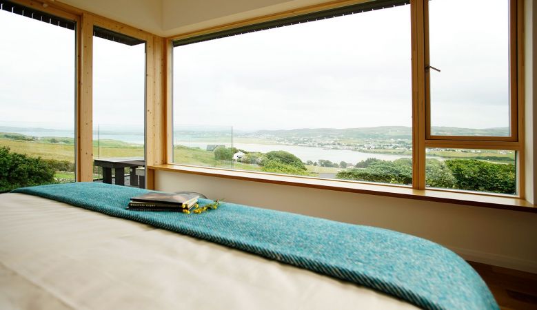 Views from Breac. House - Bed throw in Atlantic blues made by Eddie Doherty, handwoven Irish tweed, in Donegal, Ireland