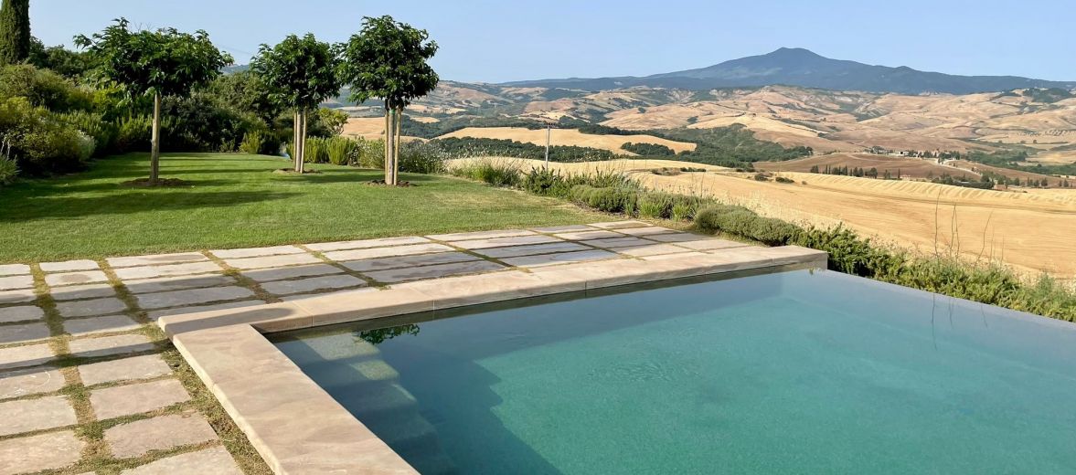 Tuscany Swimming pool melts into the landscape | Studio Archiloop: Architects of Amazing Heritage Hotels in Italy 