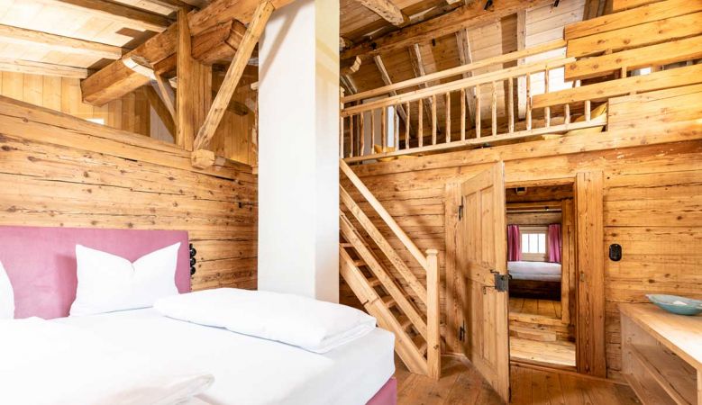 Traditonal Alpine Bedroom in Pine Timbers | Brandleit Boutique Chalet in Hart, ZIllertal Alps, Tirol, Austria