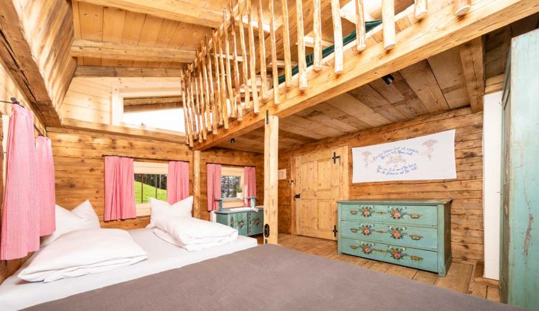 Traditonal Alpine Bedroom in Pine Timbers | Brandleit Boutique Chalet in Hart, ZIllertal Alps, Tirol, Austria