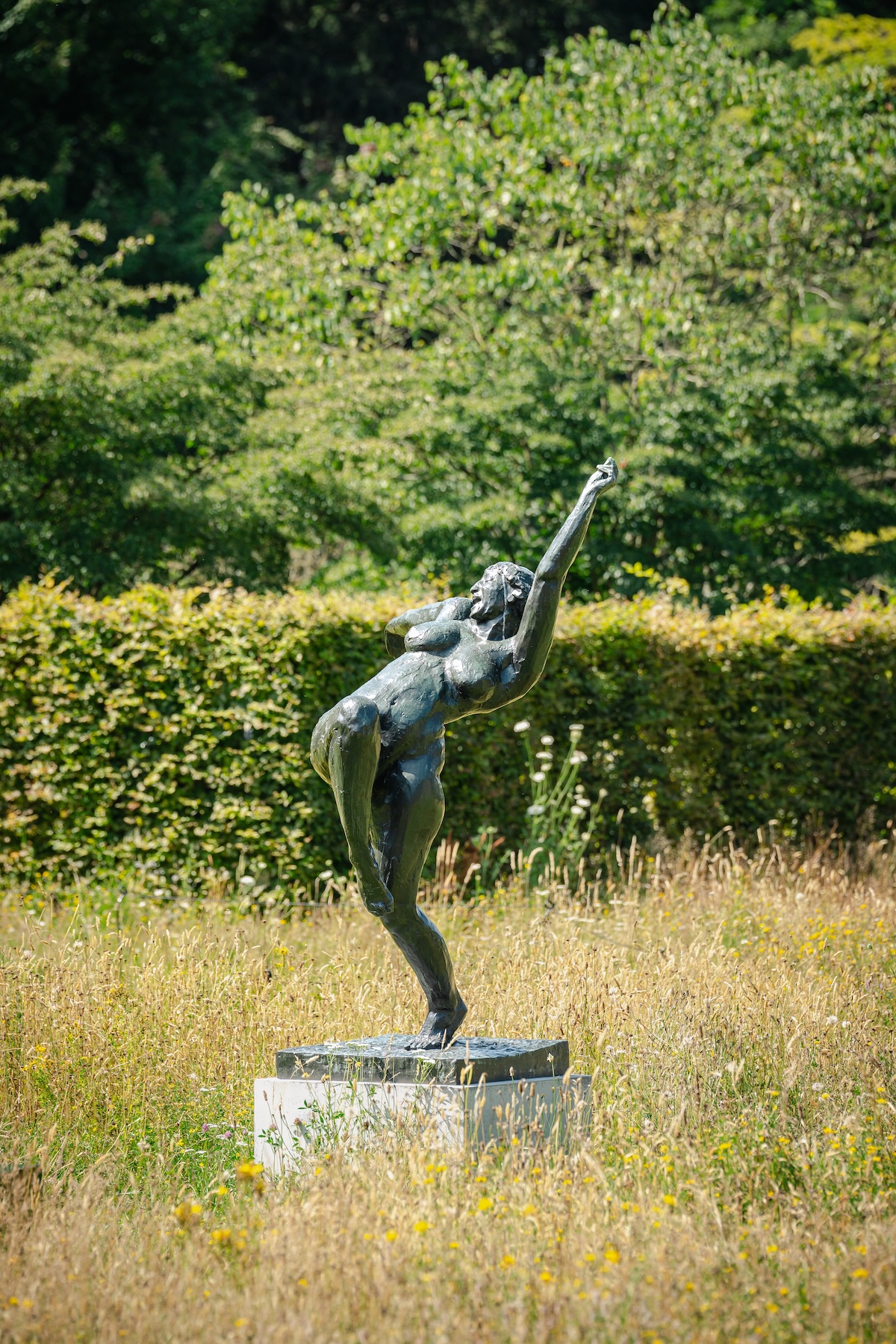 Rik Wouters bronze dancer Het Zotte Geweld in the meadow at the Middelheim Museum, Antwerp | The Aficionados