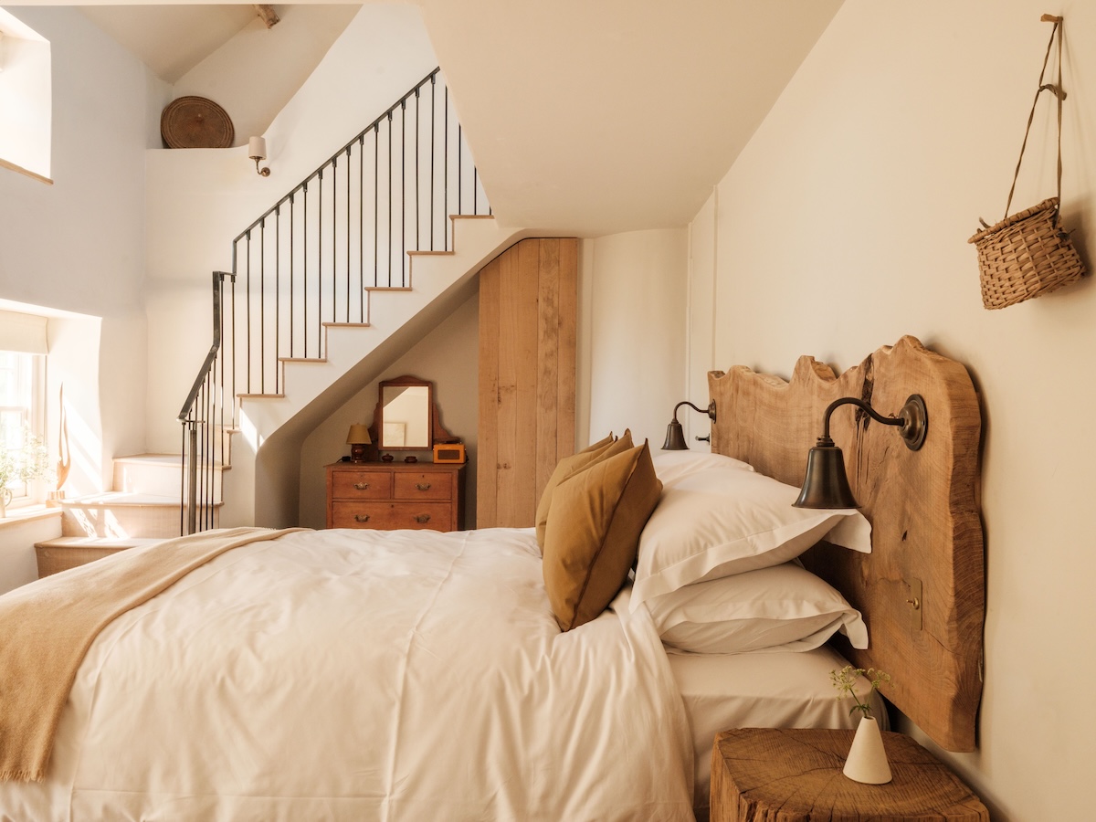 Modern Contemporoary Hotel Design interiors Designed by Johnny Smith of Smith & Willis white soft bedding, pastel wall paints, timber beams | Osip Bruton Somerset, England – Michelin Star Dining & Rooms | The Aficionados