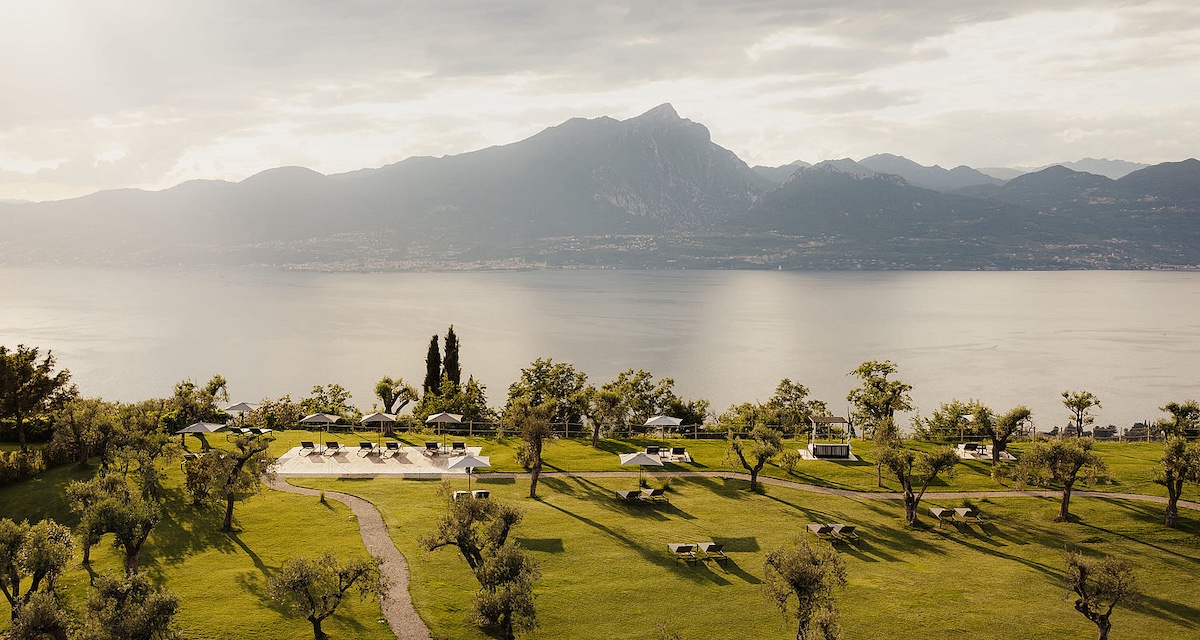 Torri del Benaco and Lake Garda in the distance. - green folding landscapes, mountains on the horizon > this is the view from the hotel Cape of Senses | Torri del Benaco
