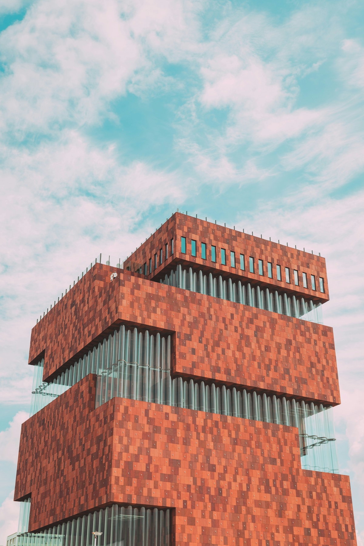 Antwerp museum exterior in abstract red brick showcasing modern art and culture
