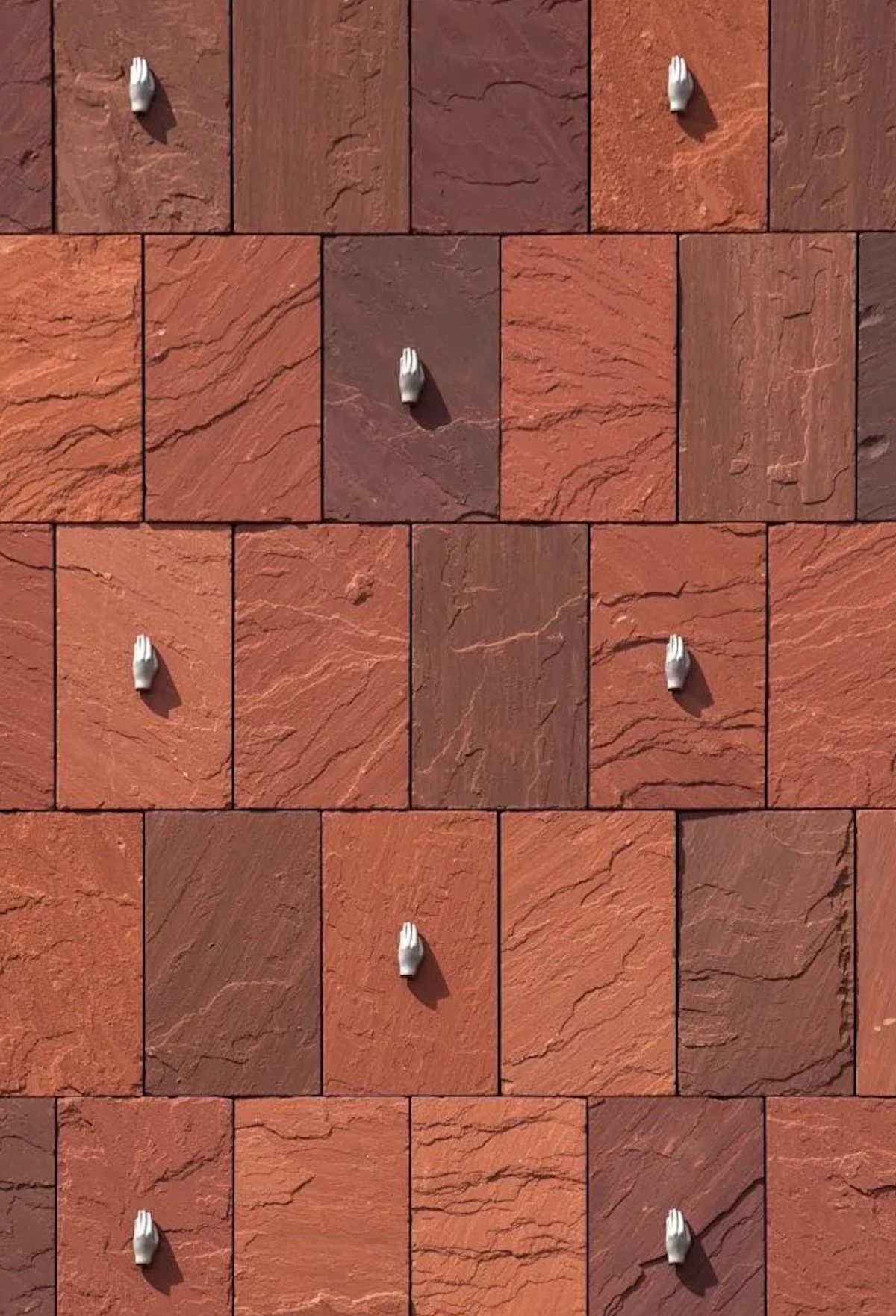 Oranbge tiles wall installation | MAS Antwerp: Architecture, Culture and Global Collections in the Eilandje District