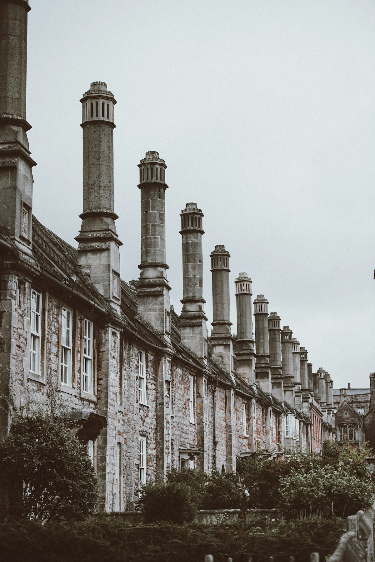 Row of interesting chimneys built of local Somerset sotne - tall, |Somerset England: Heritage, Food, Willow Weaving, Arts, Cider and Creative Culture