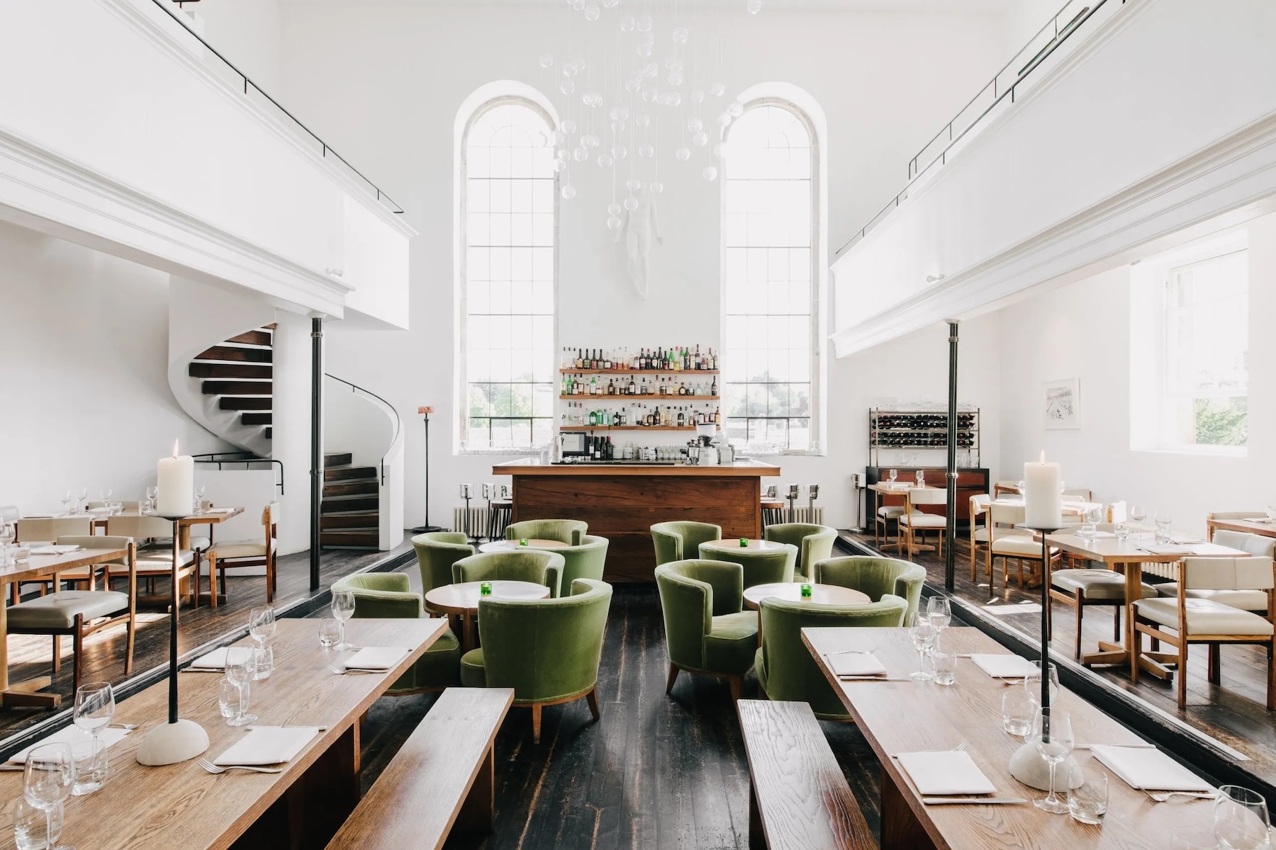 Spatial interiors in white closteral design restaurant seating |At the Chapel, Bruton – Boutique Hotel, Dining & Design Retreat in Somerset | The Aficionados