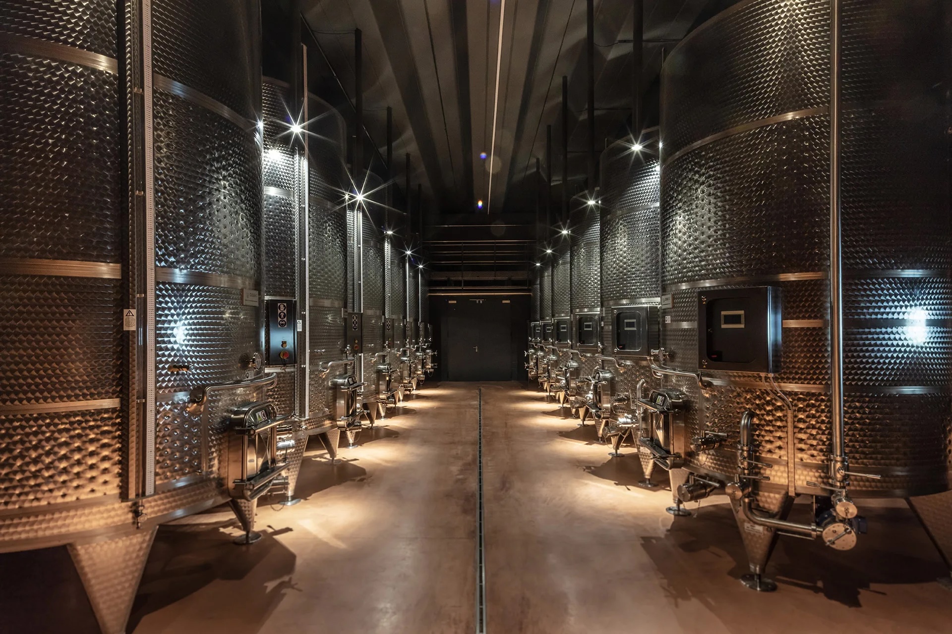 State-of-the-art stainless steel fermentation tanks inside the Filodivino winery, Le Marche Italy