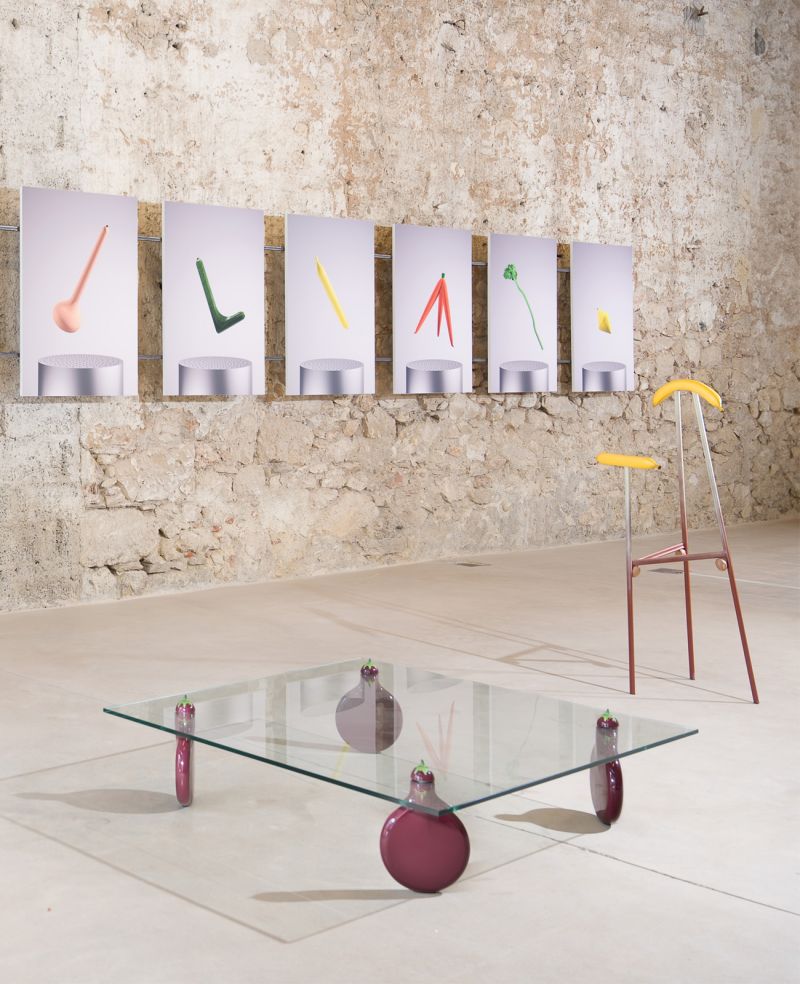 Glass table and a wall of modernist artworks in a loft environment | CARWAN Gallery Athens Greece | The Art of Desking: Stylish Hotels for Work, Rest & Play – The Aficionados