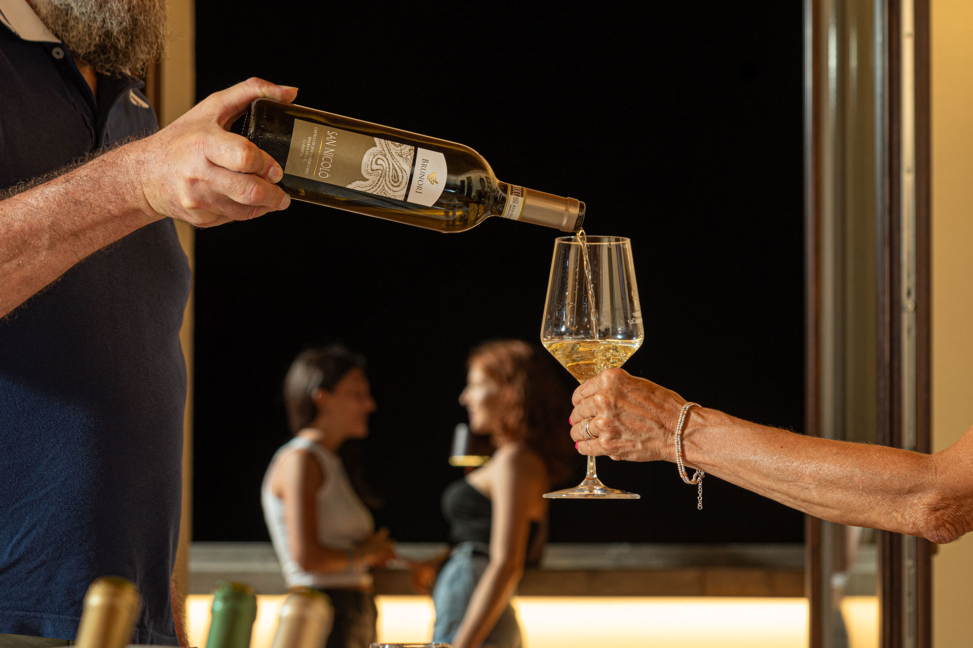 Brunori San Nicolò Verdicchio di Matelica Classico being poured at a wine tasting evening, Jesi, Le Marche Italy