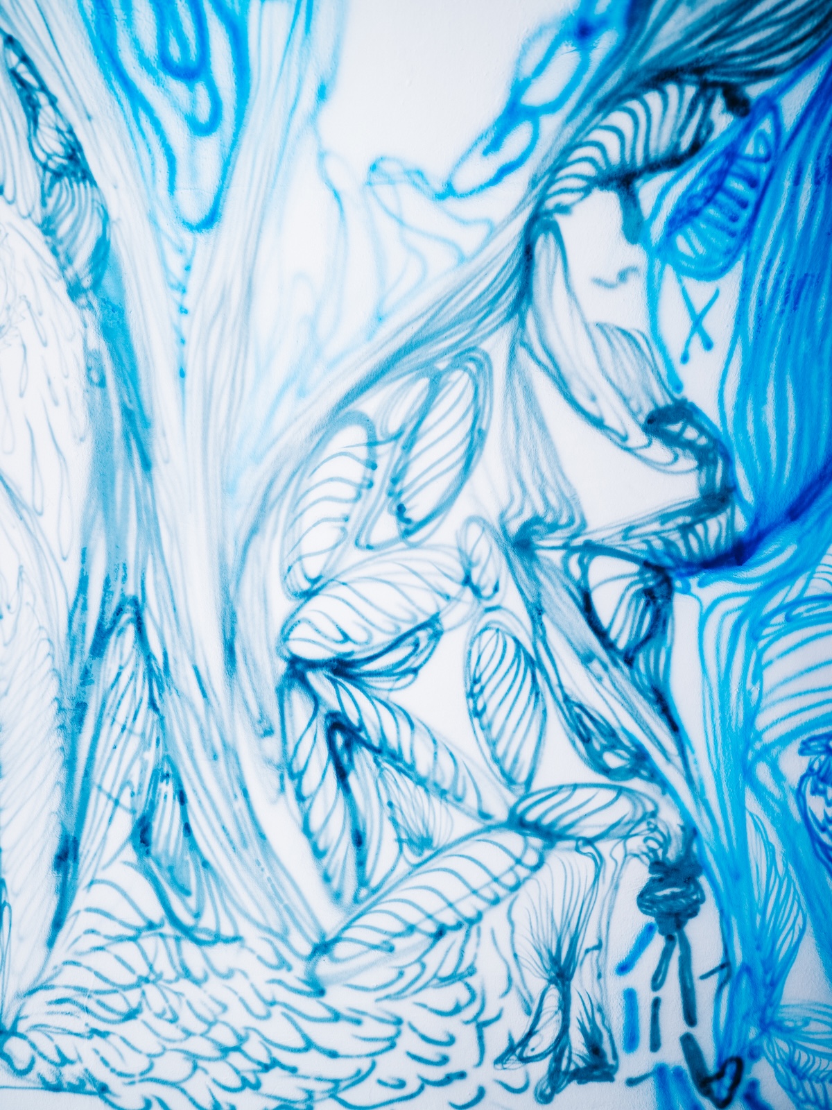 the blue airbrushed passage by Christian Schwarzwald at the Arthotel Blaue Gans, Salzburg | The Aficionados