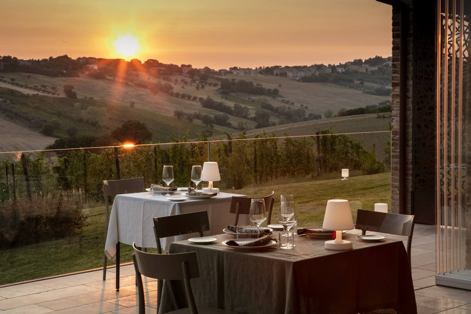 Sunset over Hills Golden sunset over rolling hills and vineyards in Le Marche during truffle season and harvest