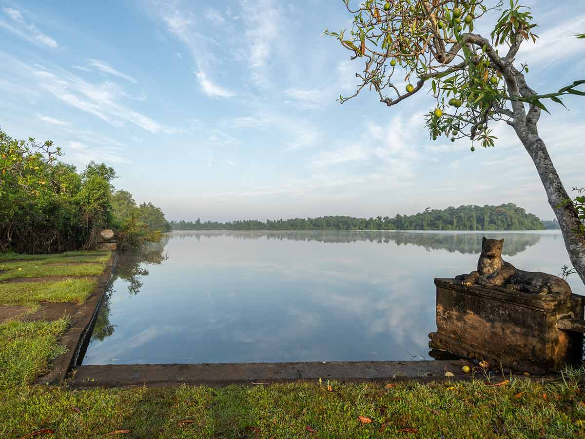 Bronze leopard beside the still water at Lunuganga, Geoffrey Bawa's country garden estate, southwest Sri Lanka | The Aficionados