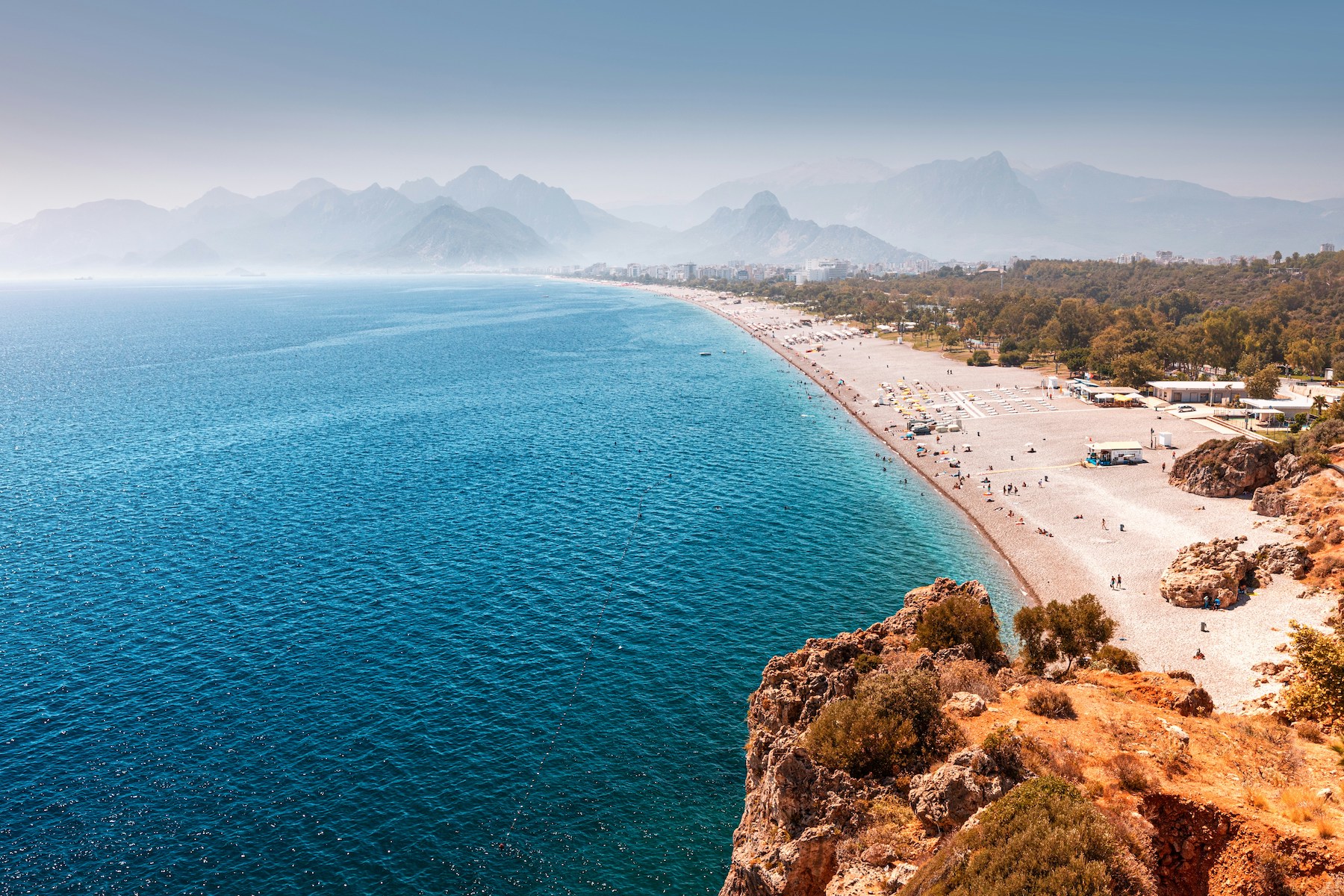 Wild beach against blue seawaters of the Aegean in the Turish Mediterranean |Untamed Beauty of Türkiye’s Riviera: A Journey Through Ancient Bays and Forested Shores
