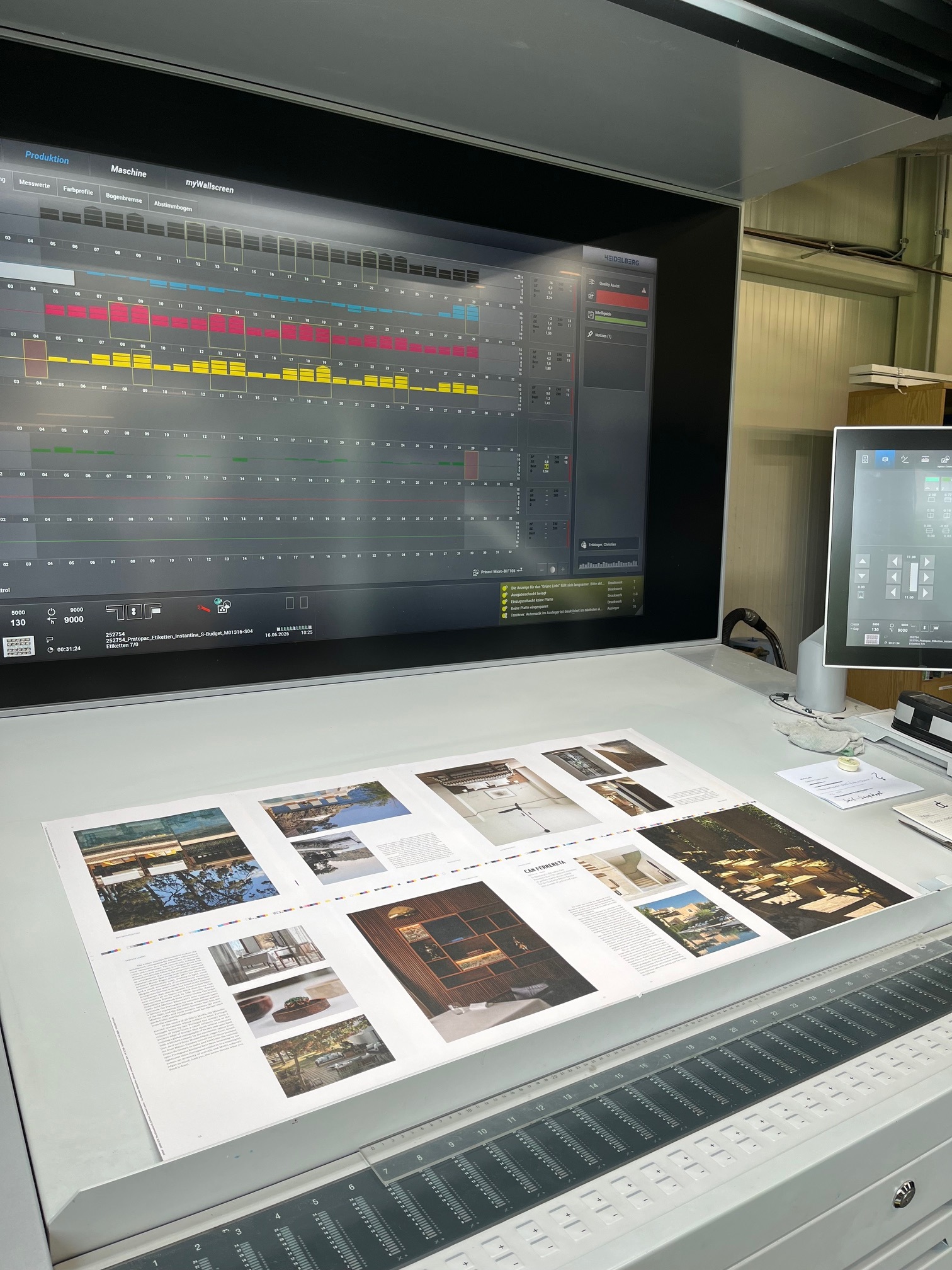 A press sheet of Unwaxed Lemons on the colour console, hotel spreads laid out for ink approval during printing | The Aficionados