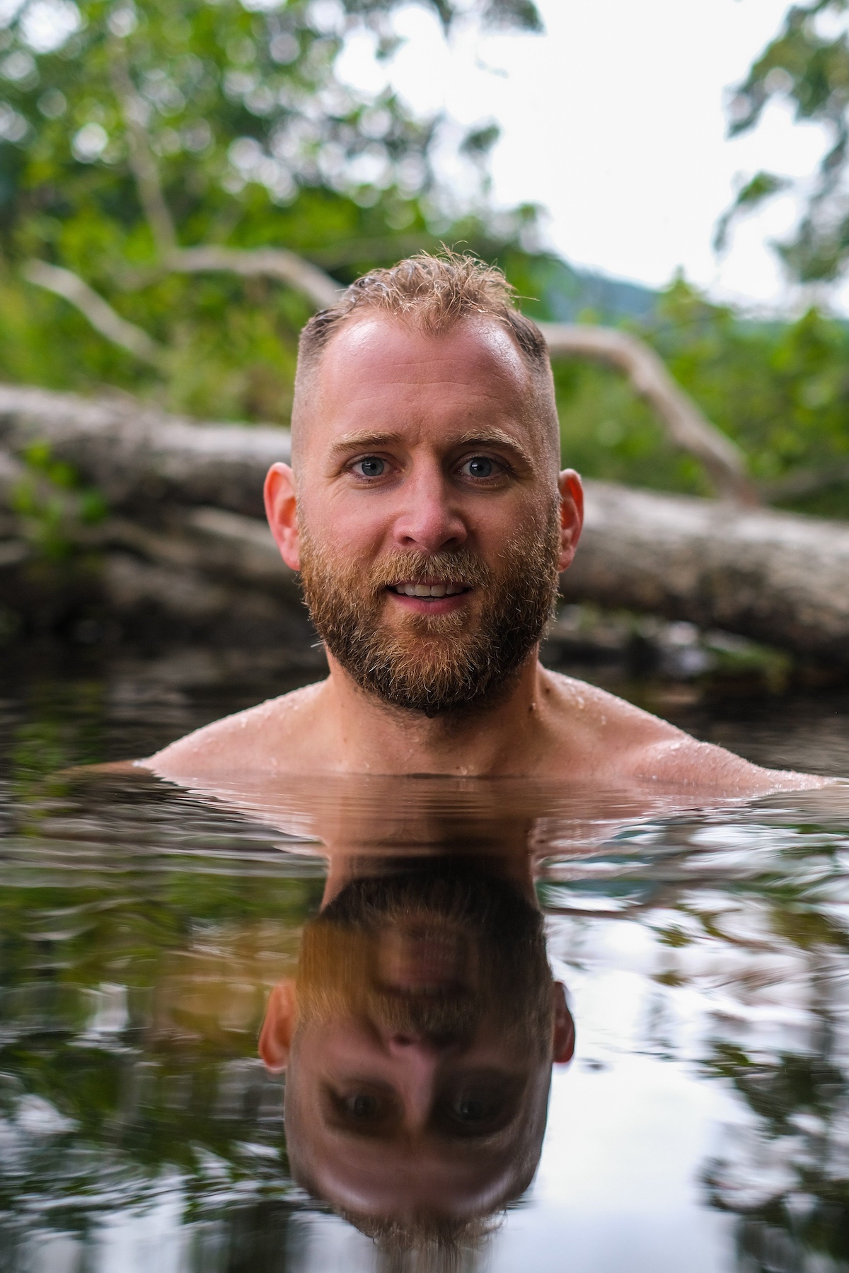 Calum Maclean wild swimming in Perthshire Scotland | Dun Aluinn Curated Retreats – Wild Swimming, Yoga & Highland Culture