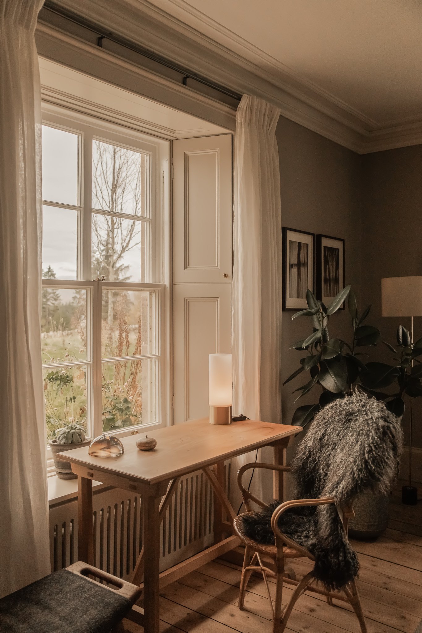 Wirting desk in the georgian sahd window frame of Killiehuntly Farmhouse in Scotland - Sheep skin fur on Danish chair | Ruth Kramer: Interior Designer Behind Brücke 49 & Wildland 