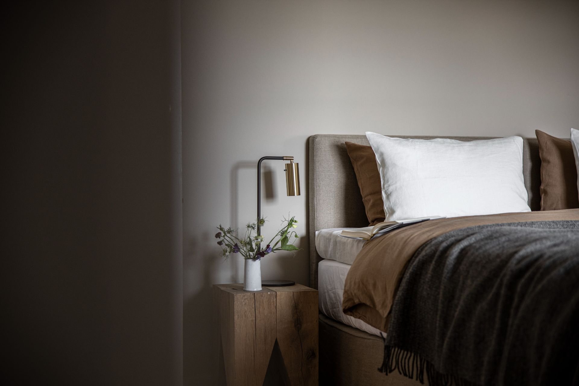 Scandi Scot Styling at Brucke 49 Vals - Grey tones, soft sunlight linen bedding | Ruth Kramer: Interior Designer Behind Brücke 49 & Wildland