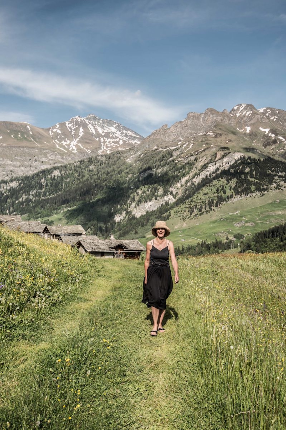 Ruth Kramer walking in the sunshine summer alps |Ruth Kramer: Interior Designer Behind Brücke 49 & Wildland