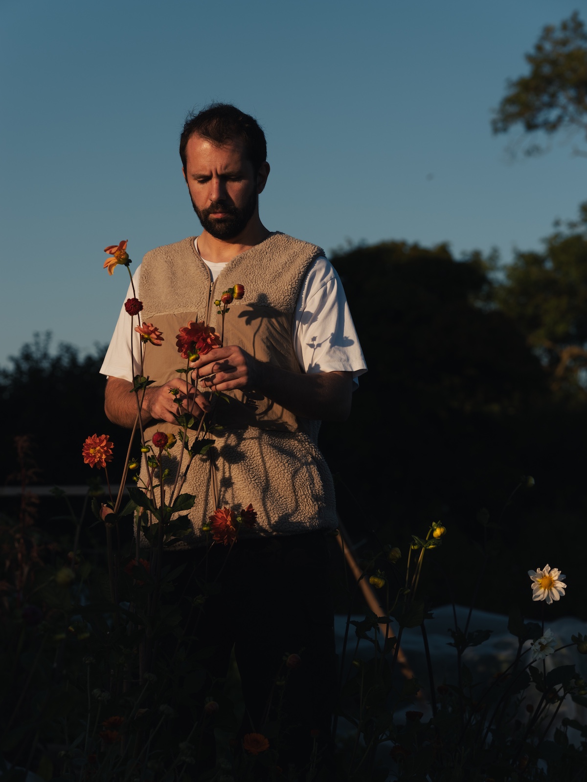 Merlin Labron-Johnson in the garden Chef Organic produce | Osip Bruton Somerset, England – Michelin Star Dining & Rooms | The Aficionados
