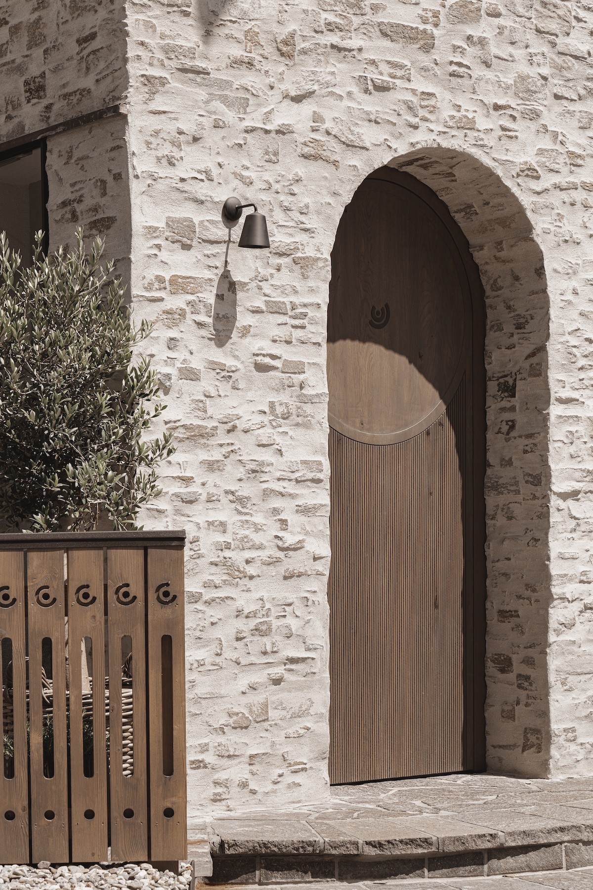 Arched doorway modern Alpine concepts| Architect Carolyn Sarah Herzog | Studio H Collective | Design Hotel Stieg'nhaus Austria 