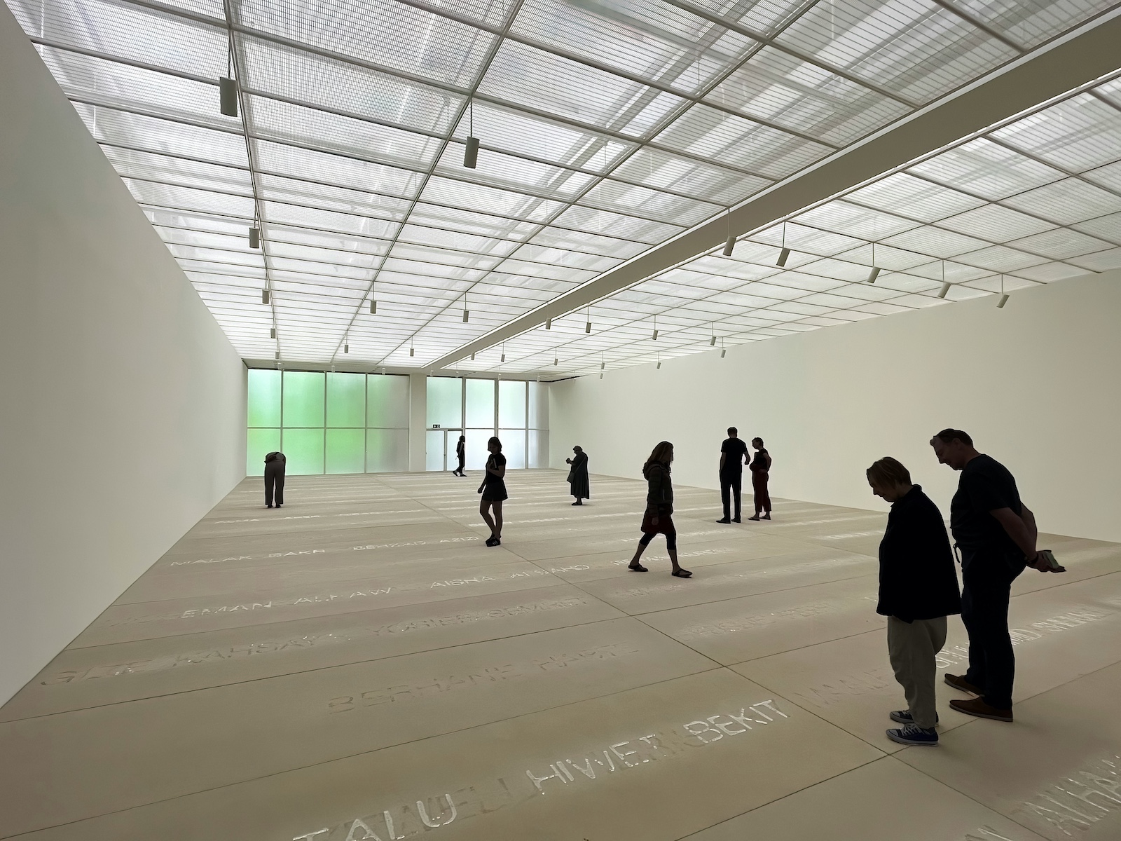 People in a Gallery - white walls, comtemporory architecture, Basel Travel Guide: Art, Architecture and Cultural Depth at the Heart of Europe | The Aficionados 