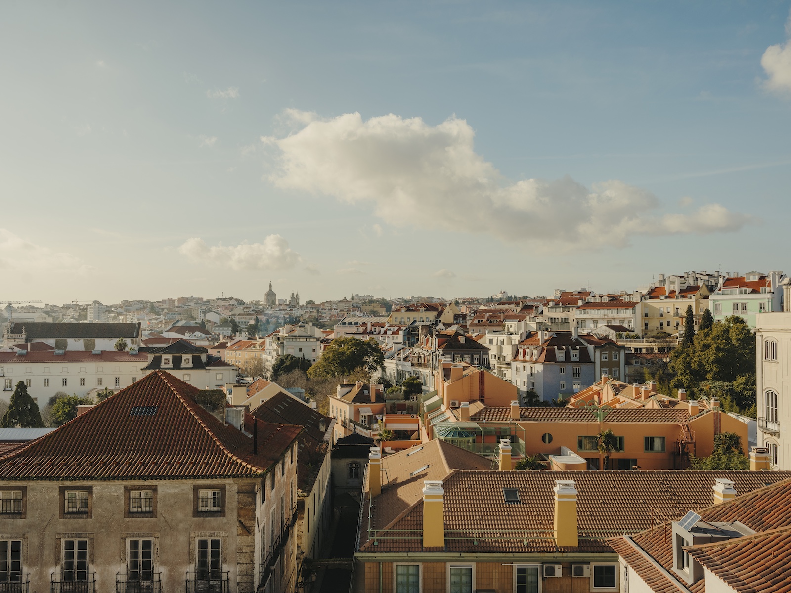 Discovering the city of Lisbon : here the skyline across Bairro Alto – Lisbon’s Poetic Soul of Fado, Design and Quiet Drama