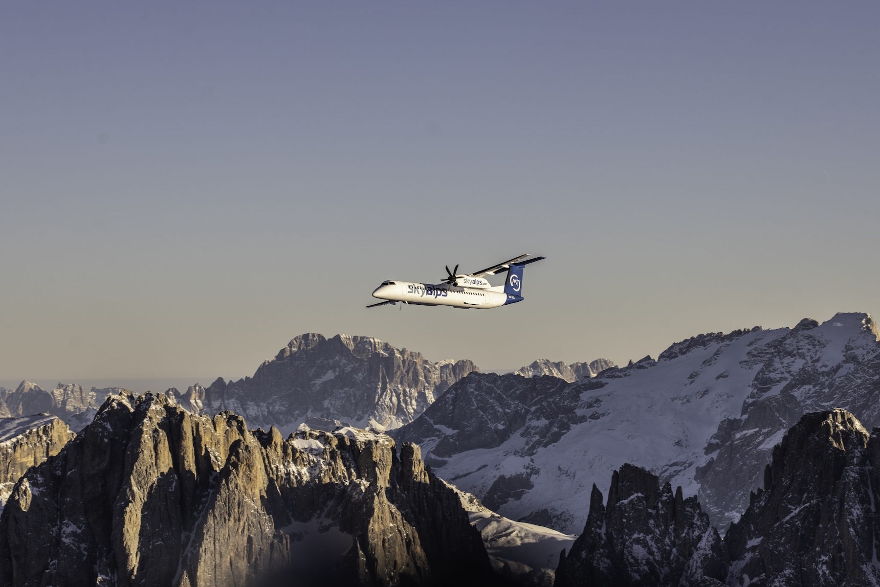 SKYALPS Airline | Flights to the Dolomites Bolzano | The Aficionados