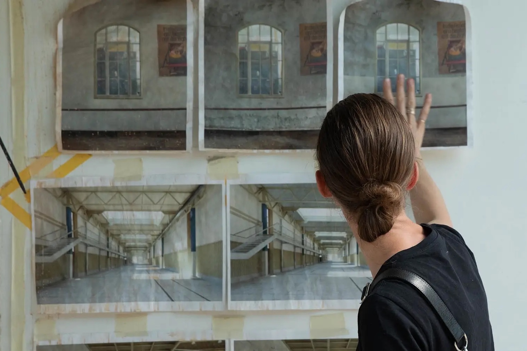Person looking at sketched blueprint plans on a weall|  Halle Q Zürich: The Maker Movement Returns to the City | Switzerland | The Aficionados 