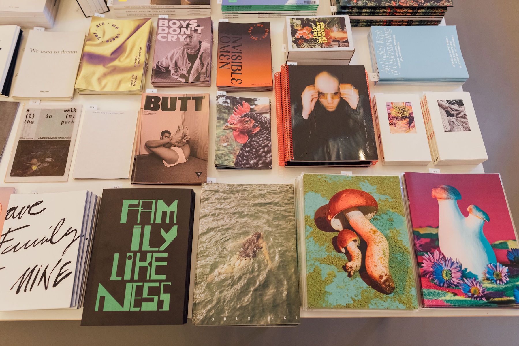 Flatlay of independent magazines at Softcover Vienna, including BUTT, Boys Don't Cry, Invisible Omen and Family Likeness.