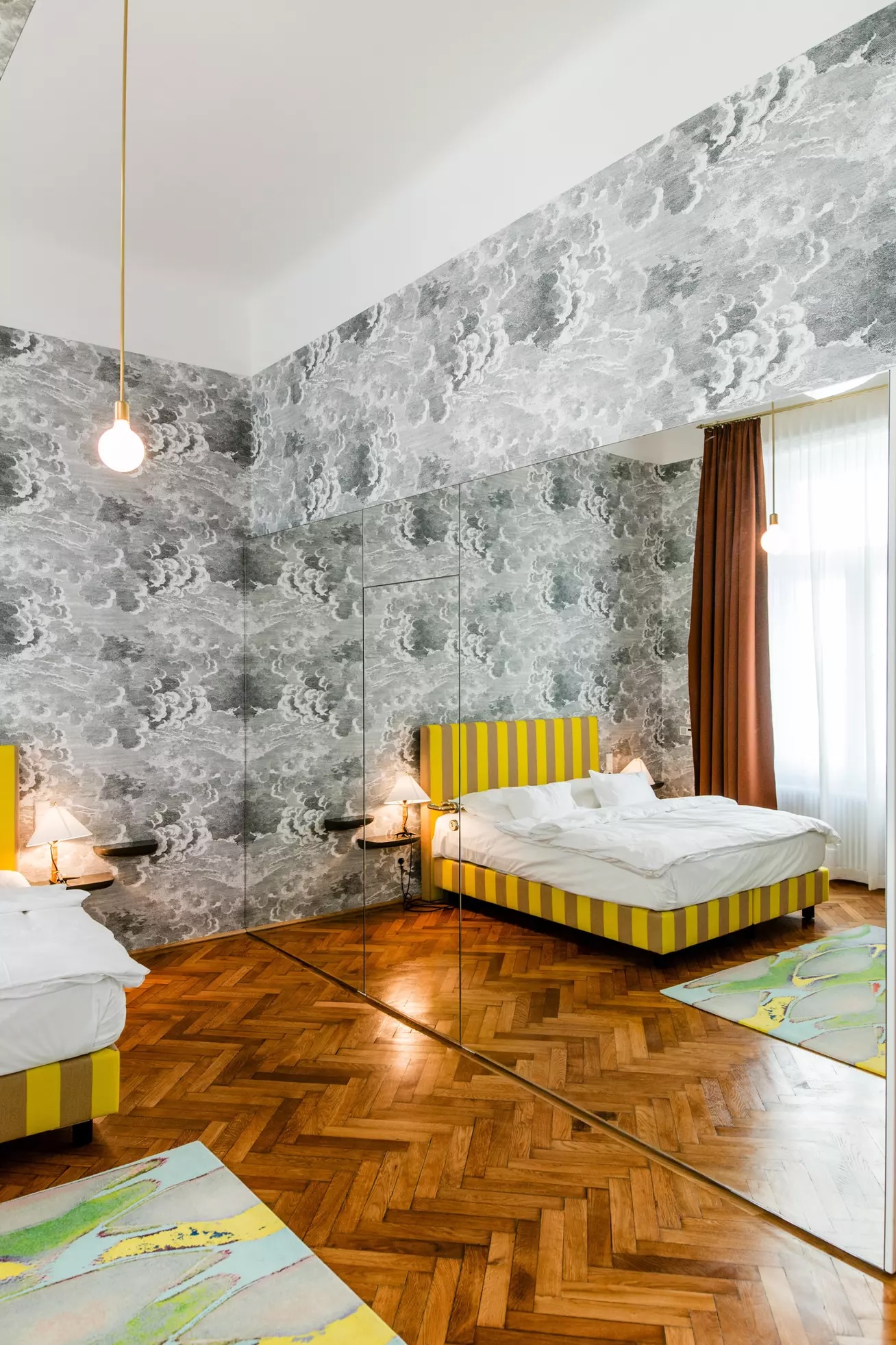 Raf Simons Fornasetti Clouds wallpaper | Boutique Hotel Bedroom desgined by Lilli Hollein Altstadt Vienna Austria | Yellow Pages: Sunshine Tones in Design, Travel & Colour Led Boutique Hotel Style