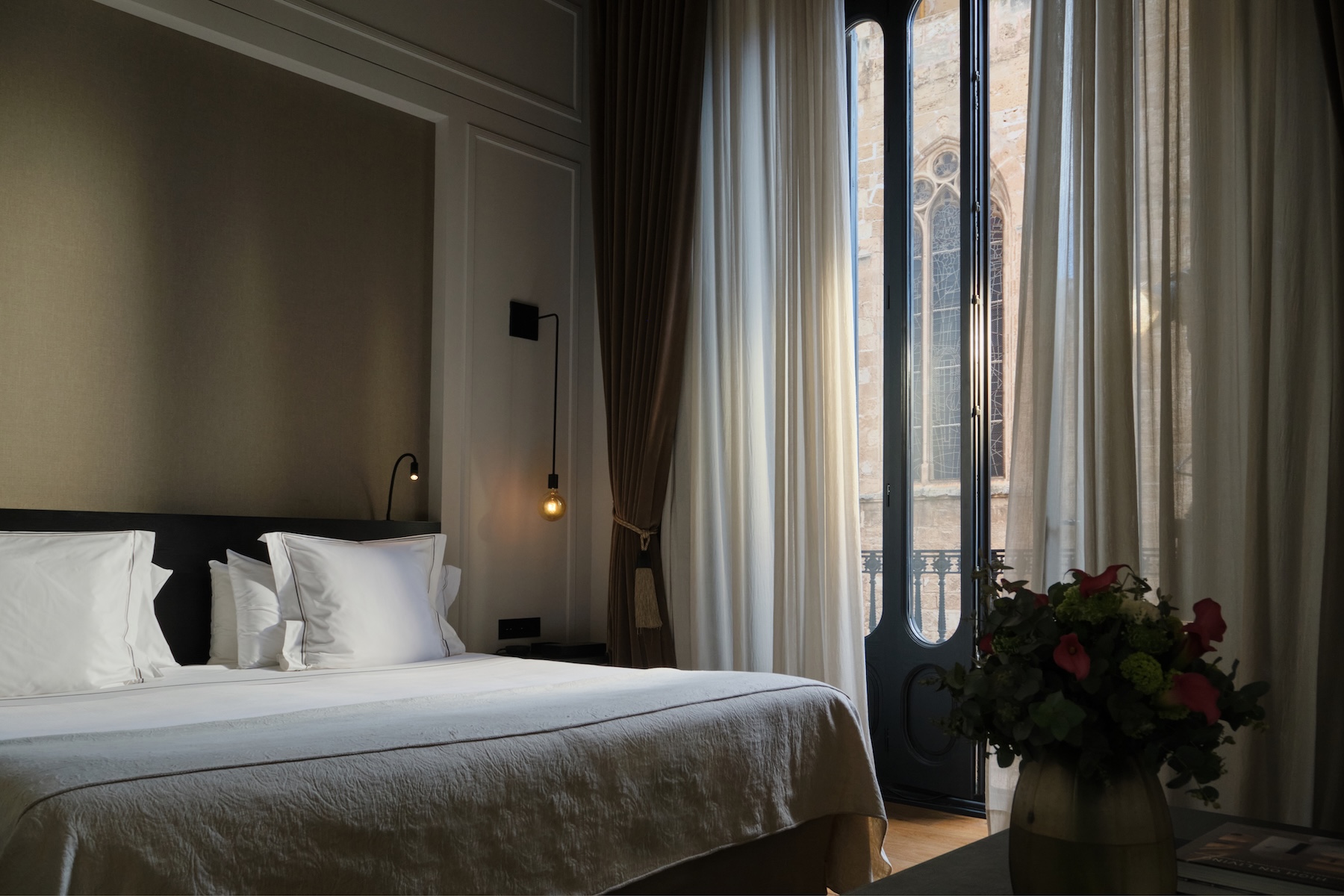 Guest room at Sant Francesc Hotel with a Gothic cathedral view through the balcony window, Palma old town | The Aficionados