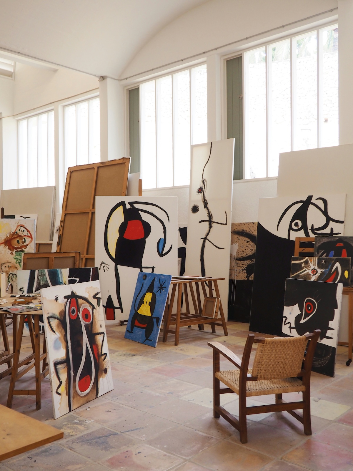 Joan Miró's studio at Cala Major, canvases and trestles left in place beneath a vaulted white ceiling | The Aficionados
