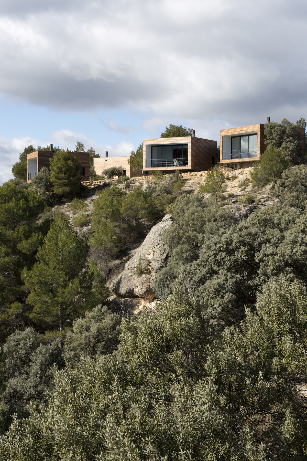 Three timber-clad Kube rooms perched on the rocky Aragonese hillside at Consolación | The Aficionados