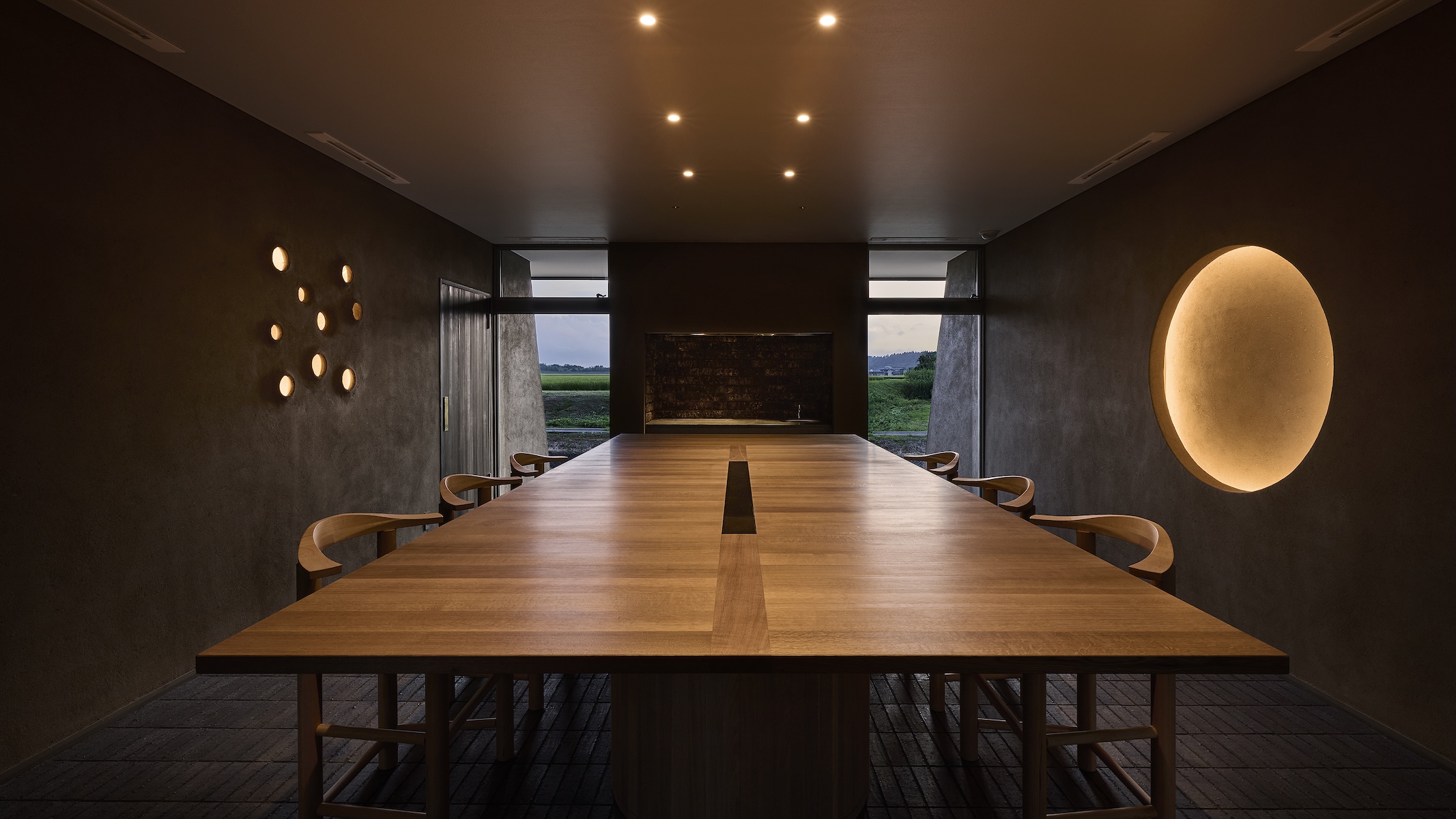 Né dining room interior, smoked Shibata cedar joinery and earthen plaster walls, Niigata, Japan | The Aficionados.